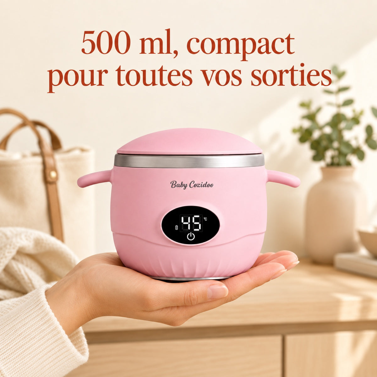 Chauffe-repas nomade 500 ml tenu dans la main, format compact pour les sorties