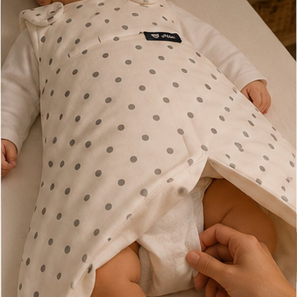 Étape 3 : ouvrir la gigoteuse par le bas pour changer bébé sans le réveiller